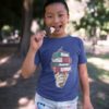girl in the park in deep blue ice cream cone with books tshirt
