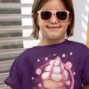 sweet girl with sunglasses in purple cute-cartoon-pink-icecream holding paintbrush tshirt