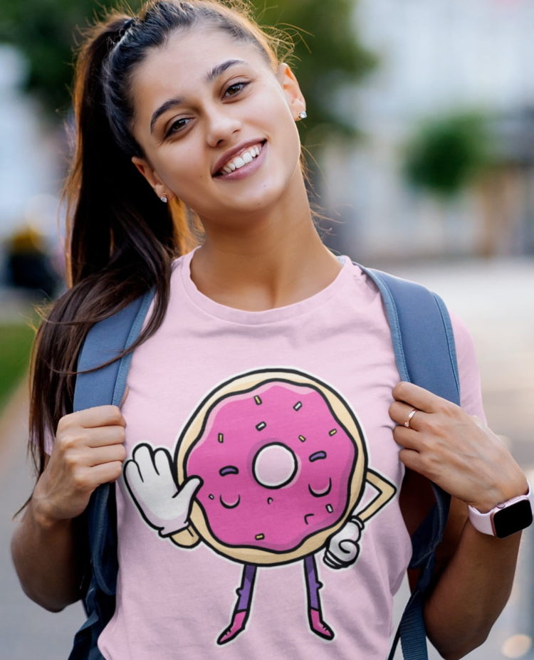 Happy Girl wearing Light Pink Tshirt with Funny Pink Donut Saying No