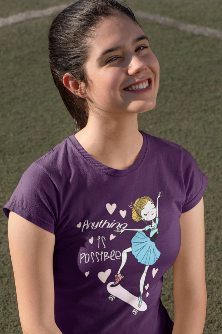 happy girl wearing Anything is possible girl on skateboard purple tshirt