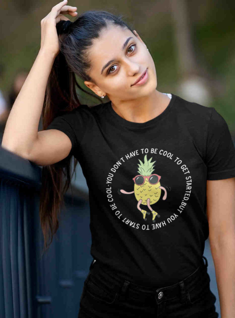 pretty girl in black tshirt with Cool Pineapple skating cartoon