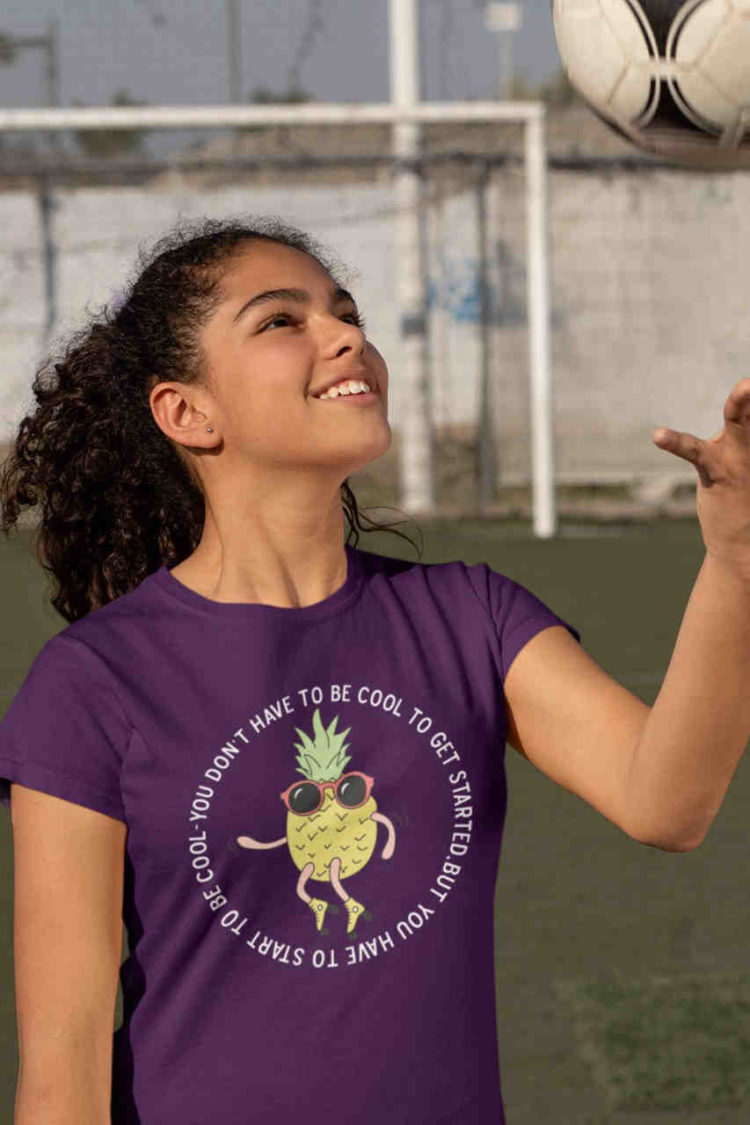 sporty girl in purple tshirt with Cool Pineapple skating cartoon