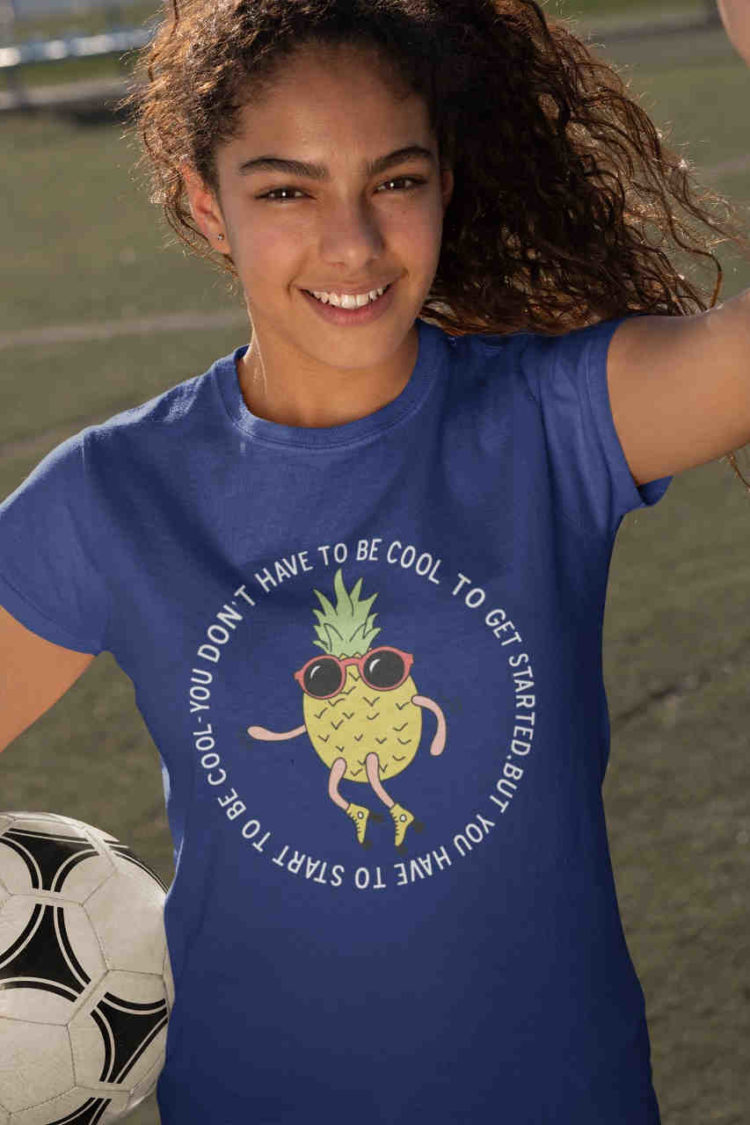 sweet girl in deep blue tshirt with Cool Pineapple skating cartoon