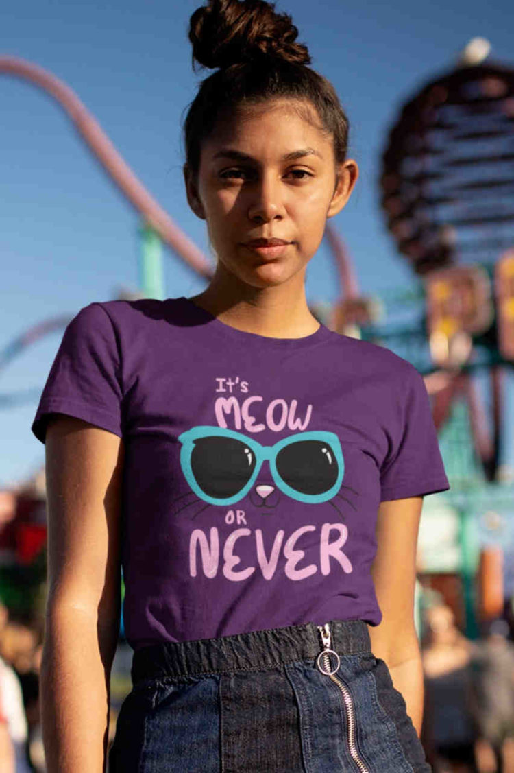 cute girl in purple tshirt with Cute kitty in sunglasses - it's meow or never