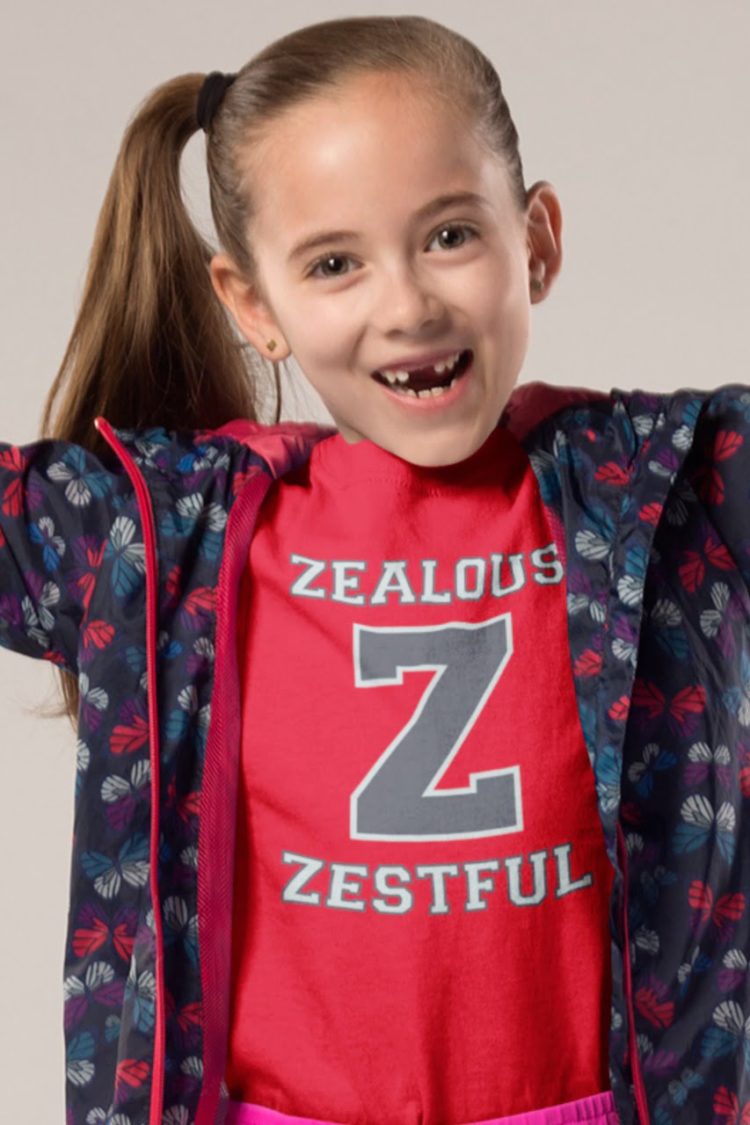 happy girl in Z zealous zestful red tshirt