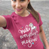 smiling girl in Dark pink Make Everyday Magical - unicorn tshirt