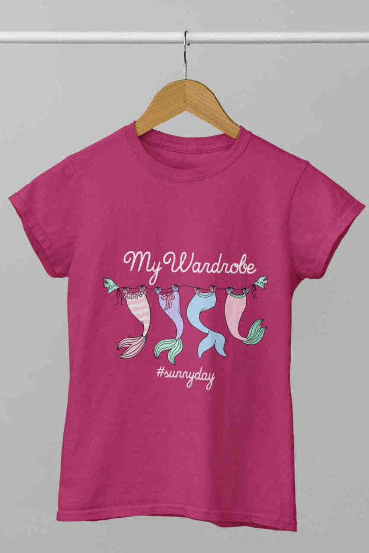 dark pink tshirt with Mermaid tails on clothesline