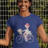 cool girl in deep blue tshirt with girl riding bicycle with cat