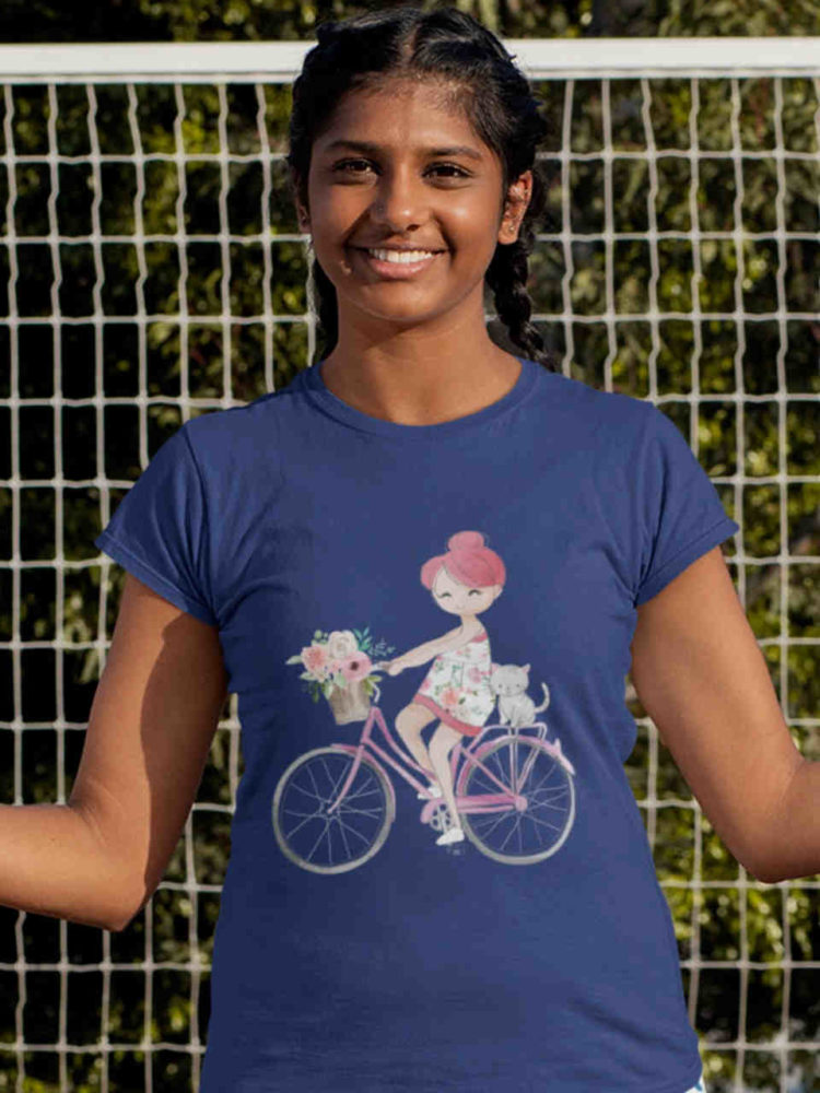cool girl in deep blue tshirt with girl riding bicycle with cat