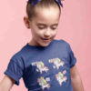 shy girl in deep blue tshirt with Unicorns with curly rainbow hair