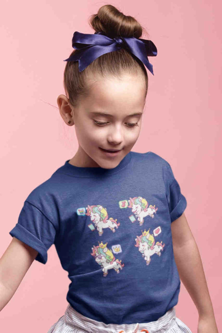 shy girl in deep blue tshirt with Unicorns with curly rainbow hair