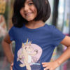 cute girl in deep blue tshirt with Funny unicorn quote