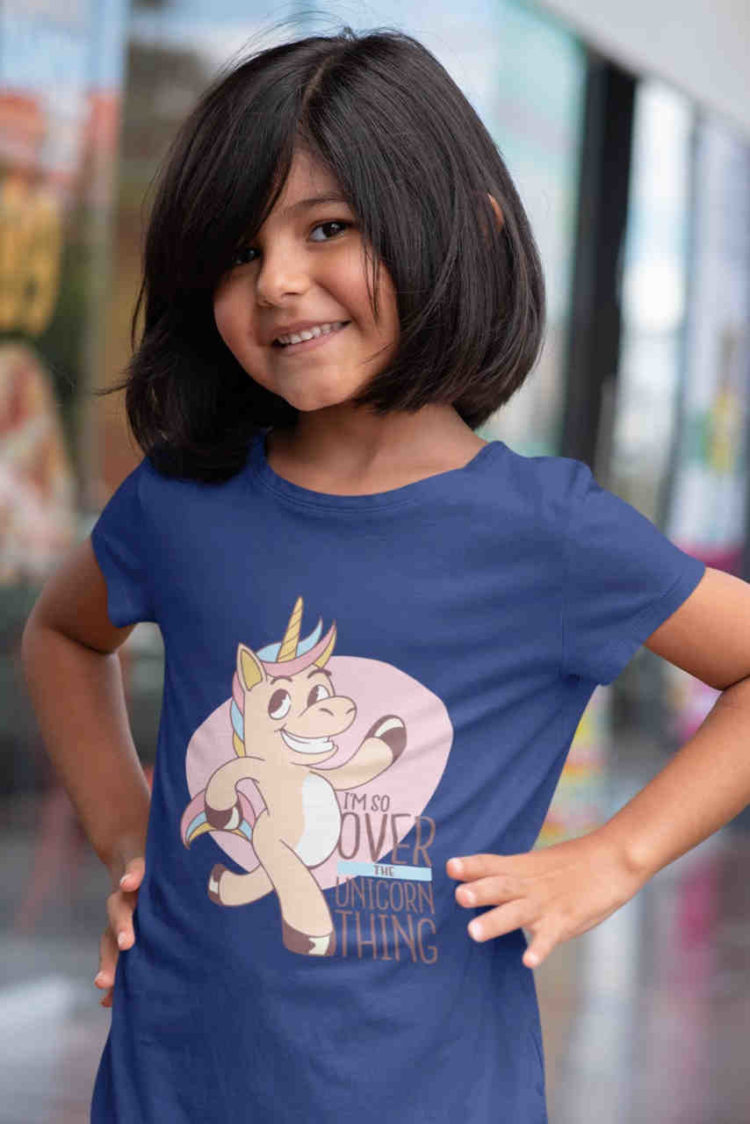 cute girl in deep blue tshirt with Funny unicorn quote