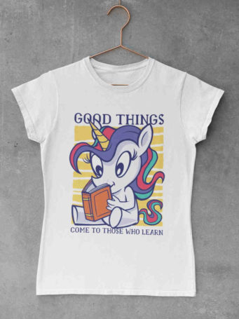 white tshirt with Unicorn reading a book