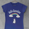 Deep blue tshirt with unicorn swinging on a rainbow