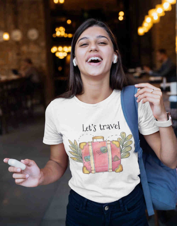 happy girl in white lets travel tshirt