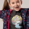 happy girl in black tshirt with happy Unicorn running with bag