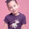 cute girl in purple tshirt Unicorn with pink hair smiling