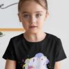 cute girl in black tshirt with Unicorn with party streamers
