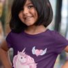 cute girl in purple tshirt with Pink Unicorn with heart with wings