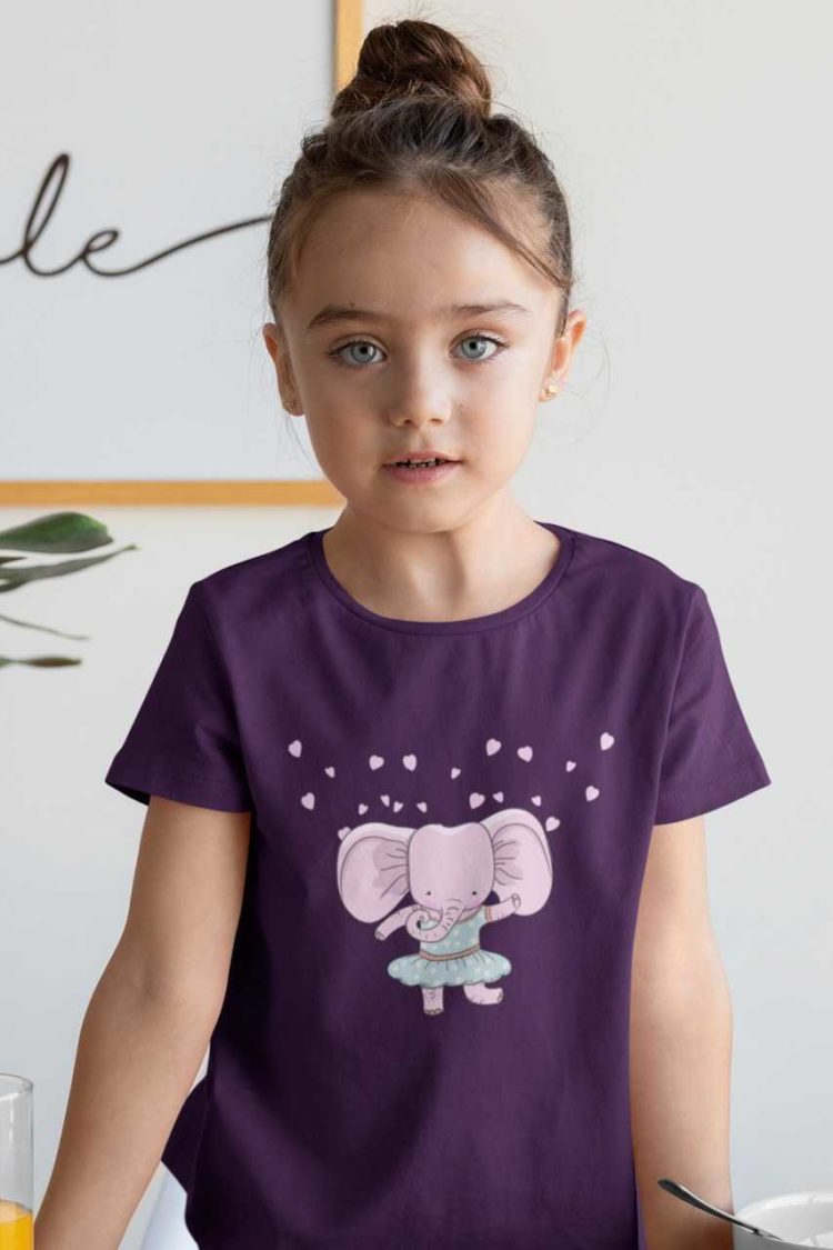 sweet girl in purple tshirt with an Elephant wearing a dress