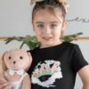 sweet girl in black tshirt with Pig Cat dog bunny duck on rainbow