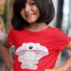 sweet girl in red tshirt with Baby elephant under umbrella