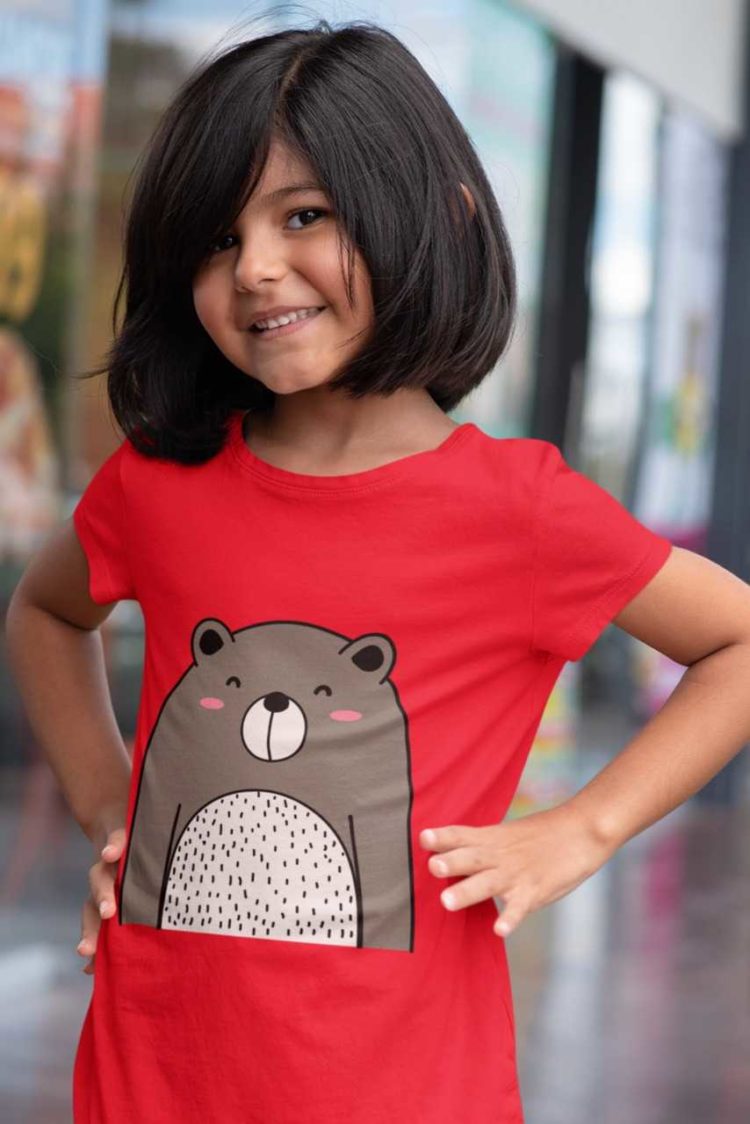 happy girl in red tshirt with a cute bear