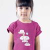 beautiful girl in a dark pink tshirt with a Little princess elephant