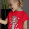 lovely girl in a red tshirt with a mermaid and seahorse