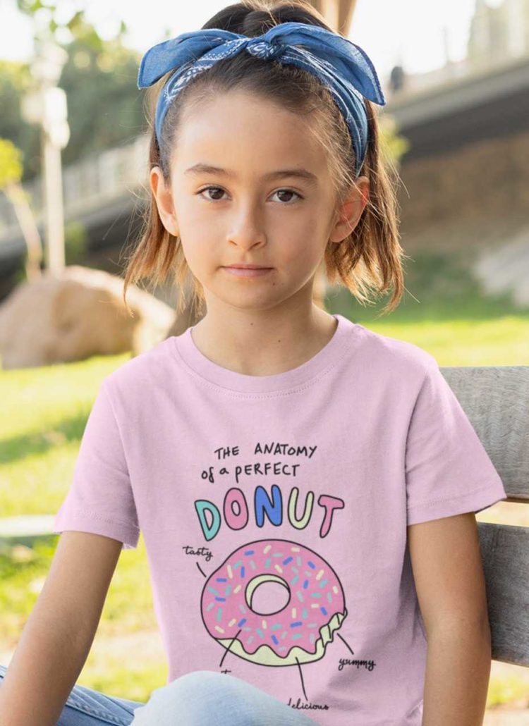 sweet girl in a light pink tshirt with Anatomy of a perfect donut