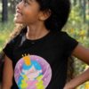 cute girl in a black tshirt with a little fairy wearing a crown