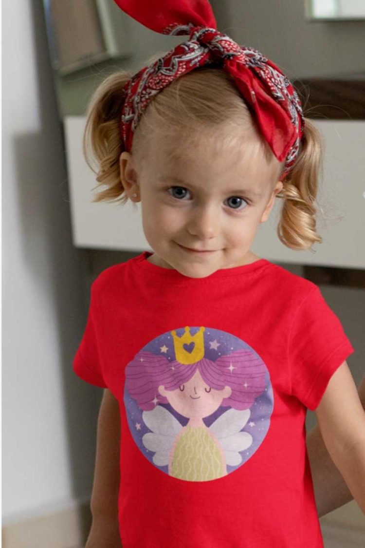 sweet girl in a red tshirt with a little princess fairy with purple hair