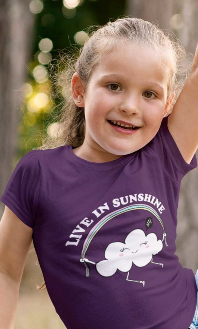 lovely little girl in a purple Live in Sunshine Tshirt