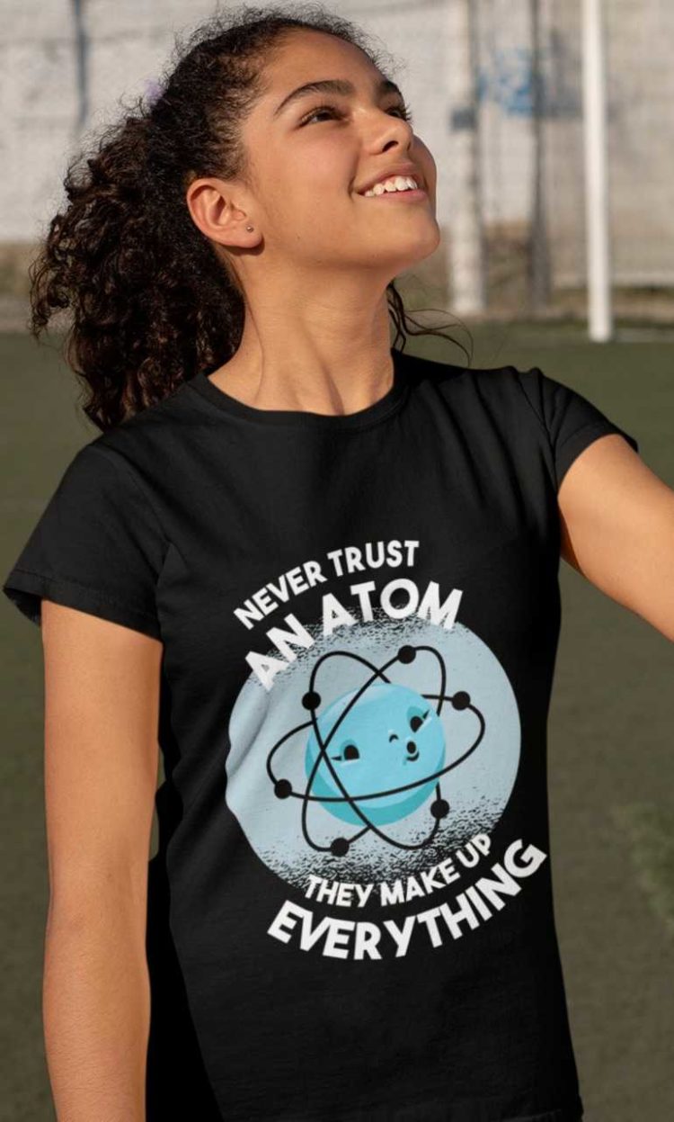 young girl in a Black Never Trust An Atom Tshirt