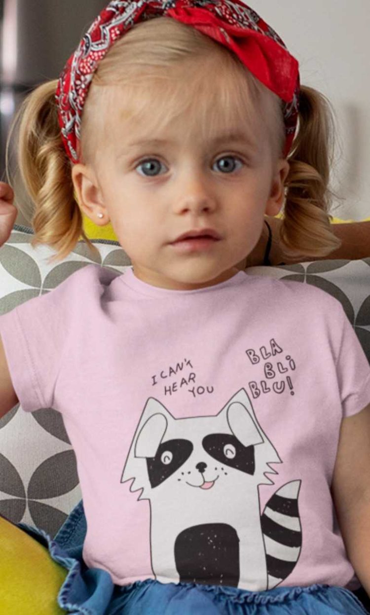Beautiful little girl in a Light Pink Funny Raccoon Tshirt