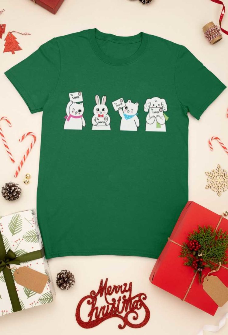 green tshirt with animals holding letter to santa