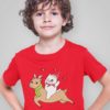 cool boy in a red tshirt with a Cat riding a Reindeer