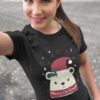 pretty girl in a black tshirt with a Bear in a santa hat