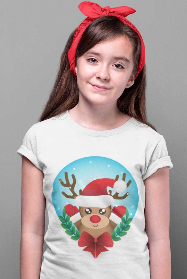 beautiful girl in a white tshirt with a Reindeer wearing a santa hat