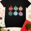 black tshirt withh Christmas ornaments