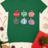 green tshirt with Christmas ornaments