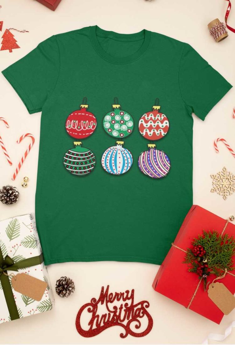 green tshirt with Christmas ornaments