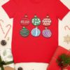 red tshirt with Christmas ornaments