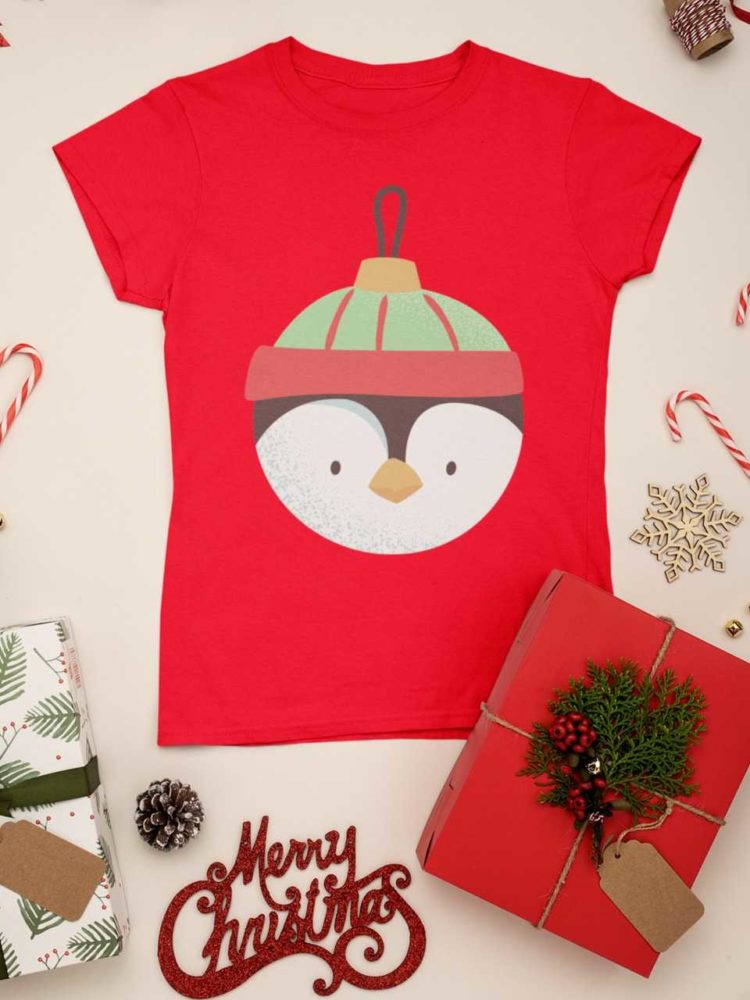 red tshirt with penguin christmas ornament