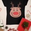 black tshirt with a Smiling reindeer face