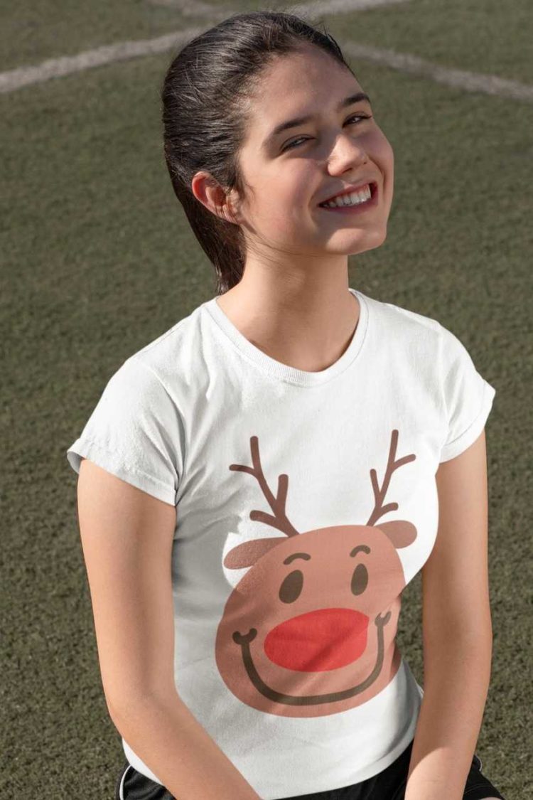 pretty girl in a white tshirt with a Smiling reindeer face