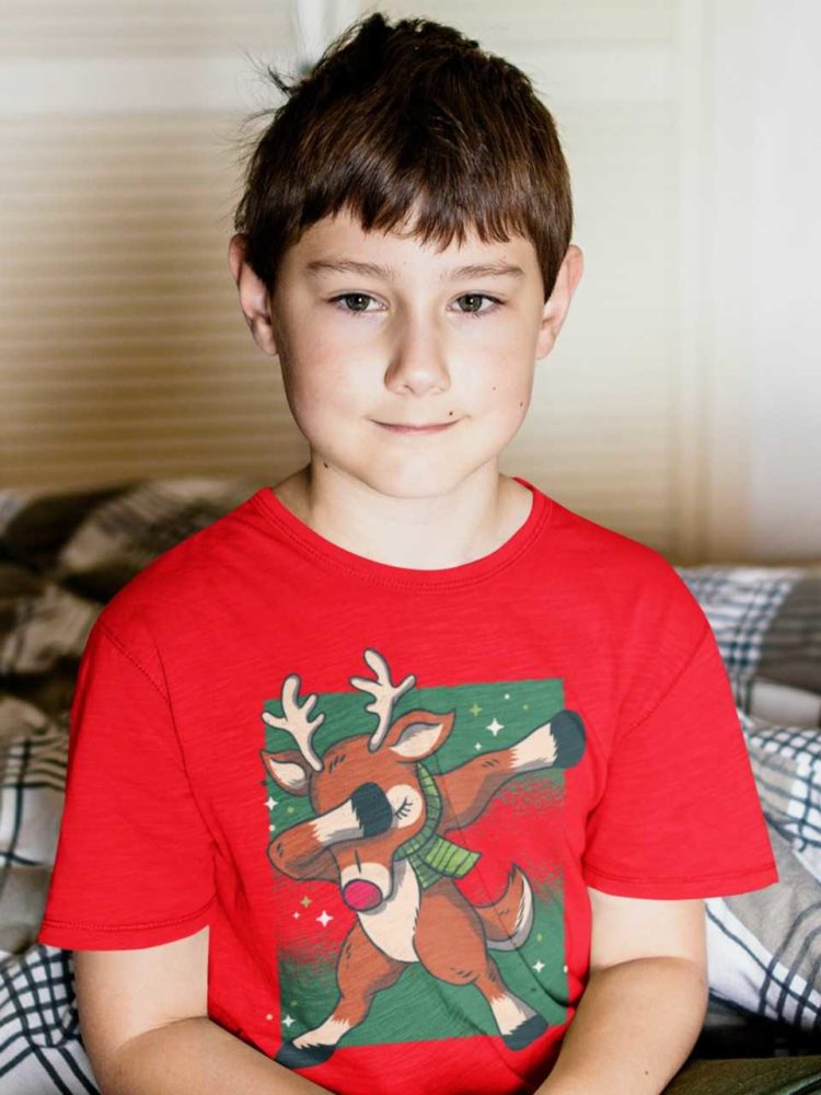 sweet boy in a red tshirt with a Reindeer dabbing