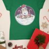 green tshirt with a Unicorn with candy canes and gifts