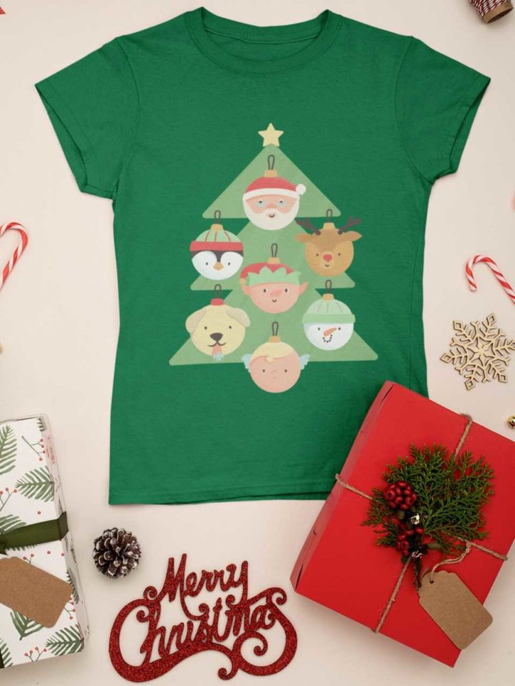 green tshirt with a christmas tree with character ornaments